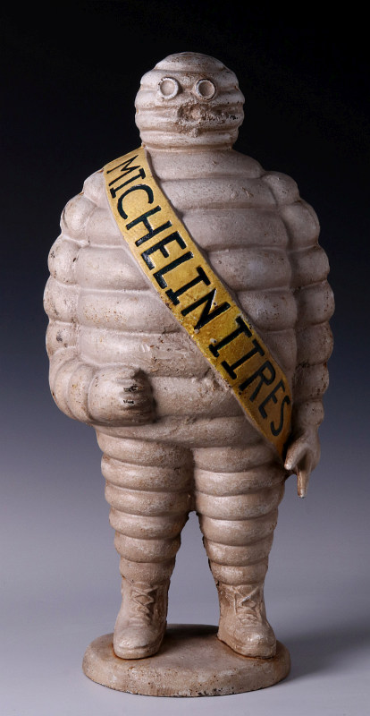 A CAST IRON MICHELIN TIRES ADVERTISING FIGURE