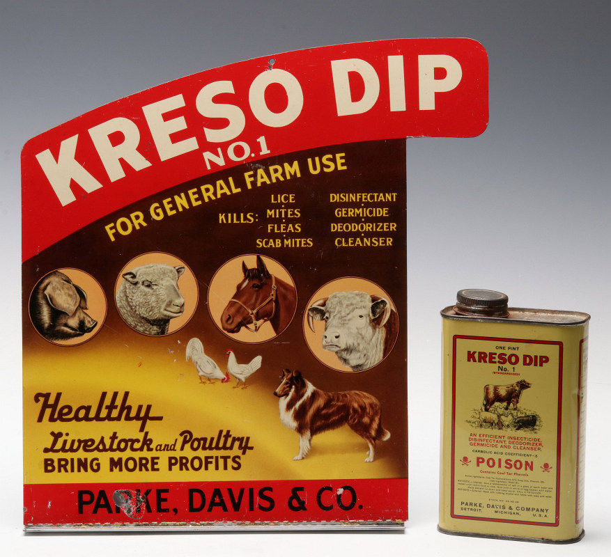 A KRESO DIP LITHOGRAPHED TIN SIGN AND PRODUCT TIN