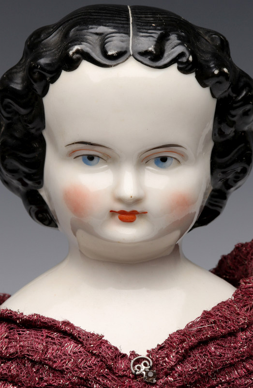 A LATE 19TH CENTURY CHINA HEAD DOLL