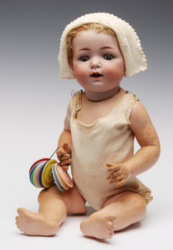 A VINTAGE BISQUE HEAD BABY DOLL