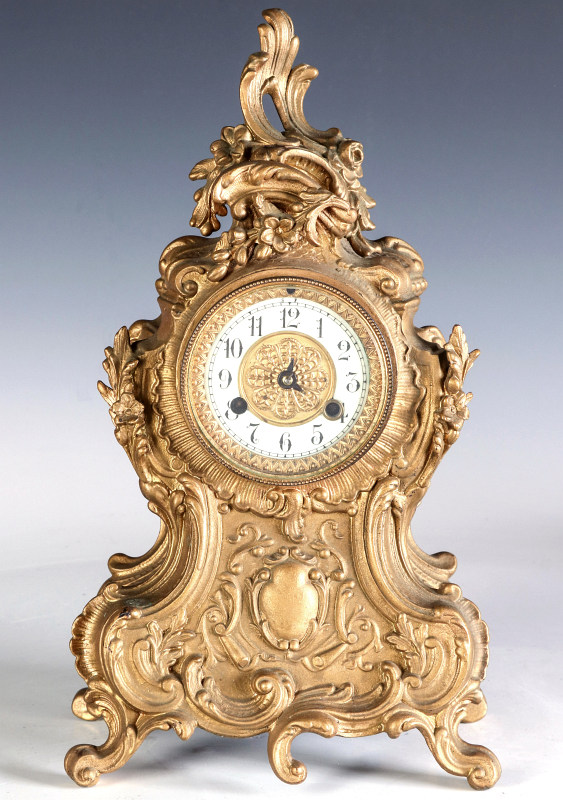 AN ORNATE FRENCH STYLE WATERBURY TABLE CLOCK