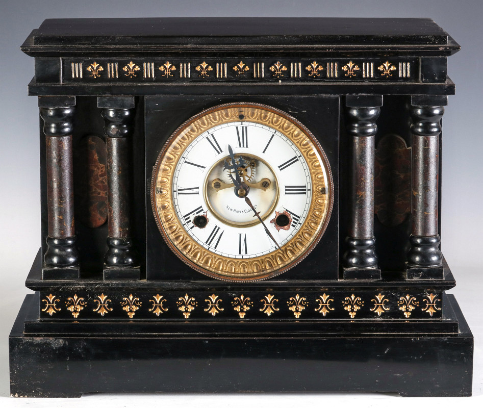 A NEW HAVEN ENAMELED IRON MANTLE CLOCK