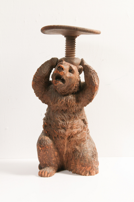 A 19TH C. BLACK FOREST CARVED WOOD BEAR STAND
