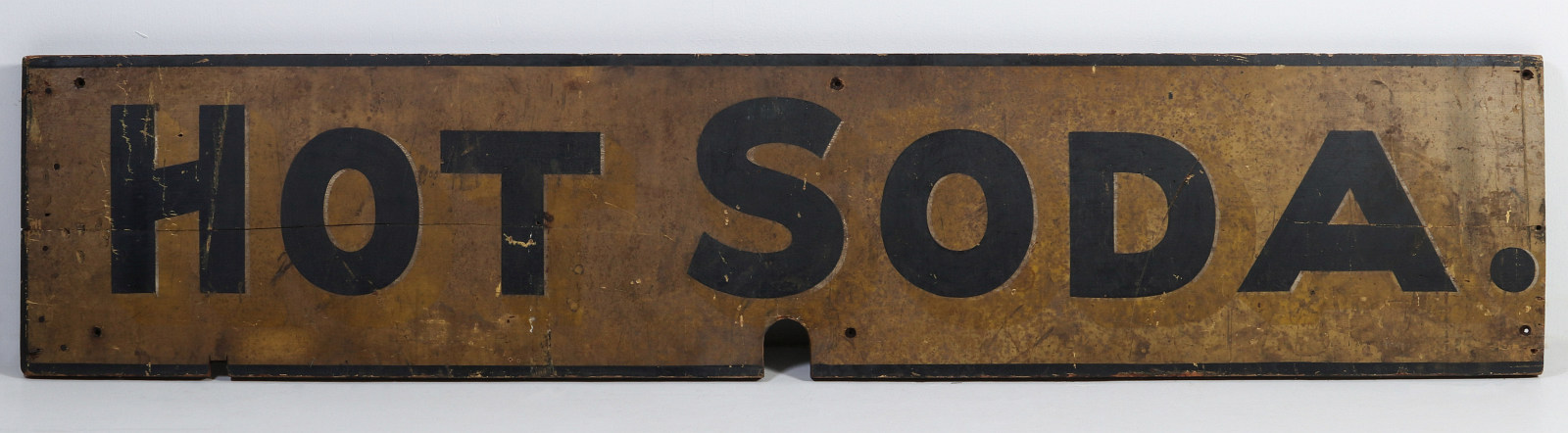 A 19TH CENTURY PAINTED WOOD SIGN FOR 'HOT SODA'