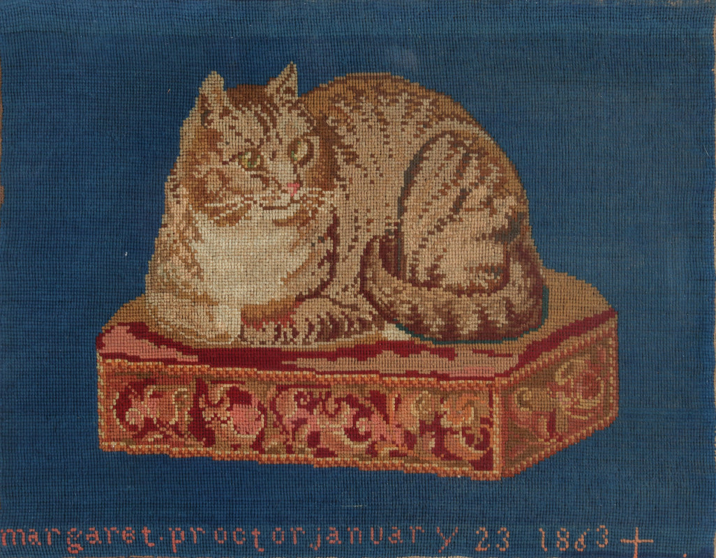 A 19TH C. NEEDLEWORK COMPOSITION OF A CAT 1863