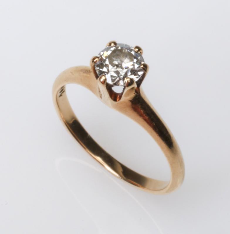 A 14K AND DIAMOND SOLITAIRE RING, APPROX .50 CT
