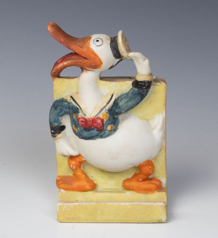 A 1930s DONALD DUCK TOOTHBRUSH HOLDER
