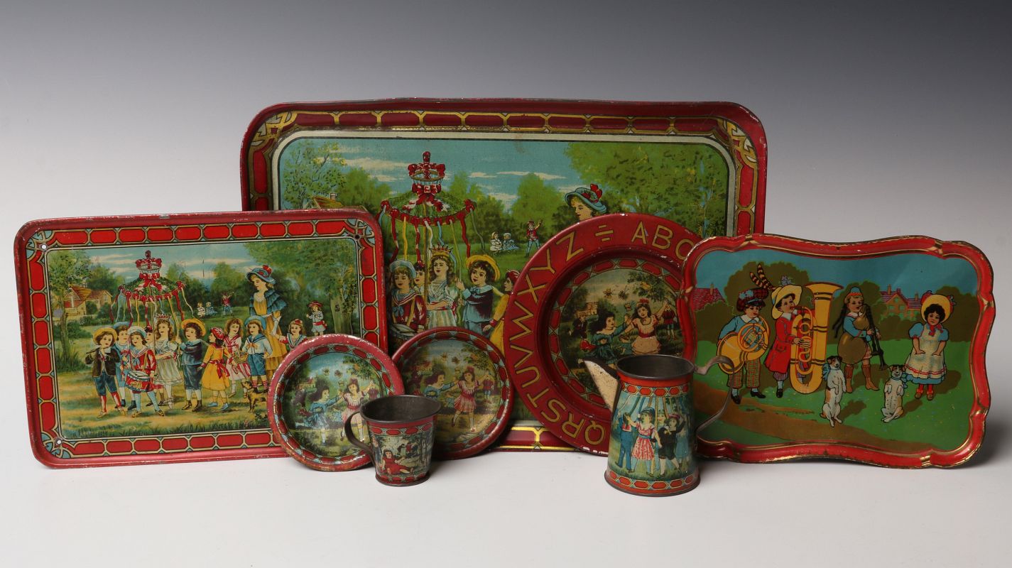 A NICE SELECTION OF VICTORIAN TIN LITHO TRAYS