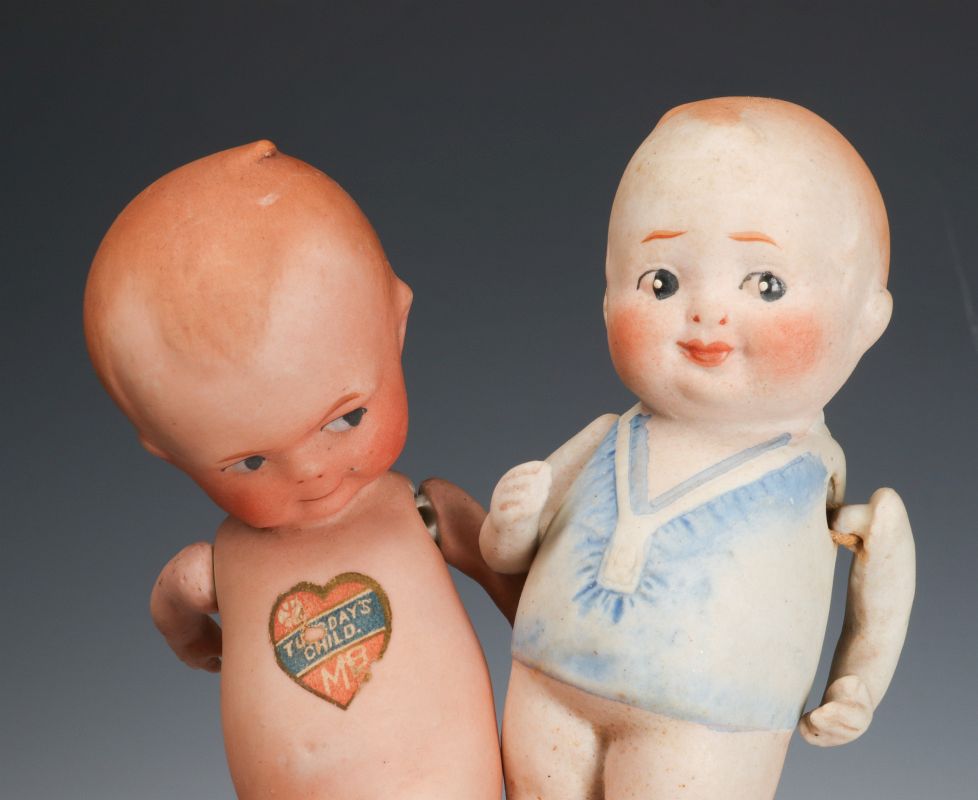 TWO ALL BISQUE MINIATURE CHARACTER DOLLS