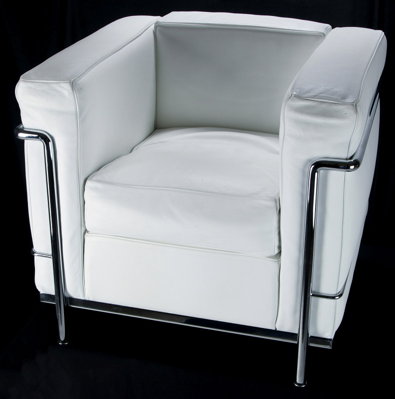 A CONTEMPORARY 'CASSINA' LC3 LEATHER ARM CHAIR