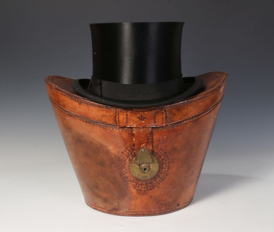 A GOOD 19TH CENTURY LEATHER HAT BOX AND HAT