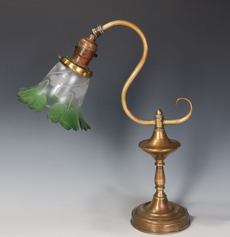 A BRASS LAMP WITH UNUSUAL CUT BACK SHADE C. 1900
