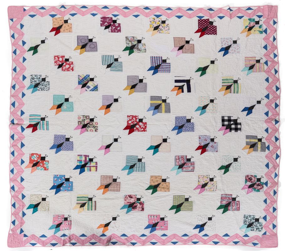 A VINTAGE BUTTERFLY PATTERN HAND MADE QUILT