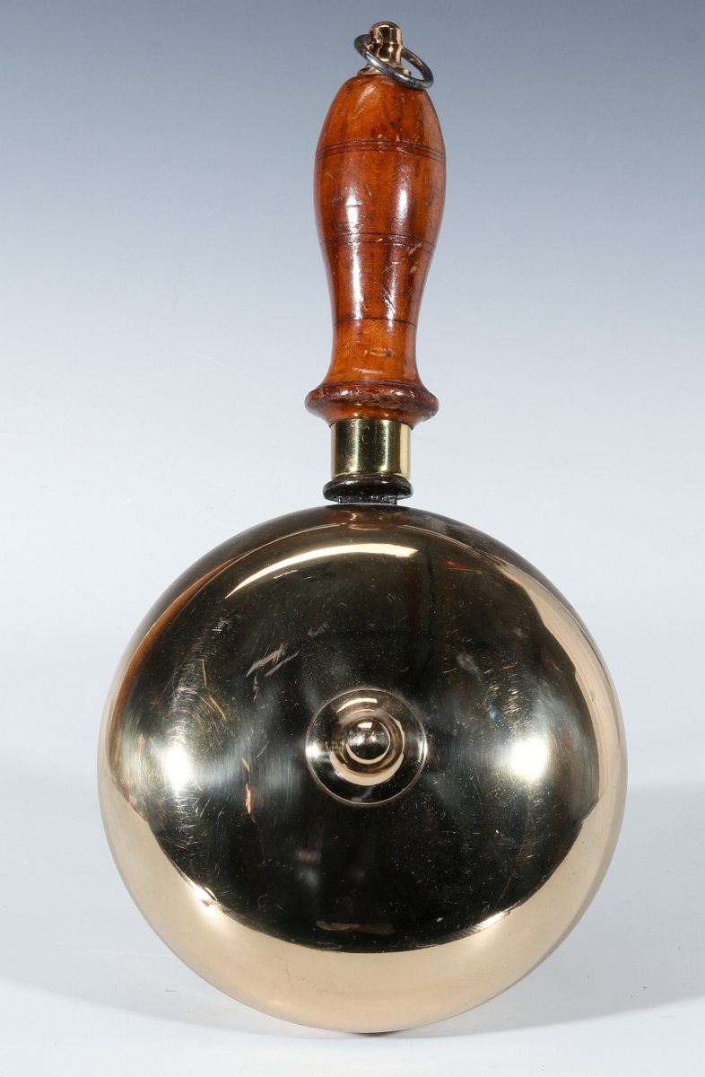 AN ANTIQUE HAND HELD MUFFIN TYPE FIRE ALARM BELL