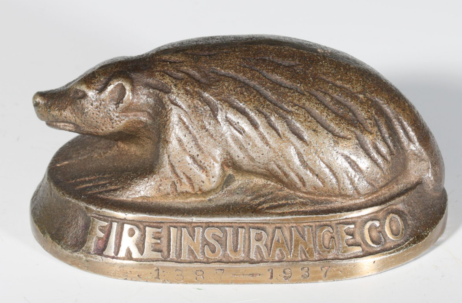 A 1930s BADGER MUTUAL INSURANCE ADVTG PAPERWEIGHT