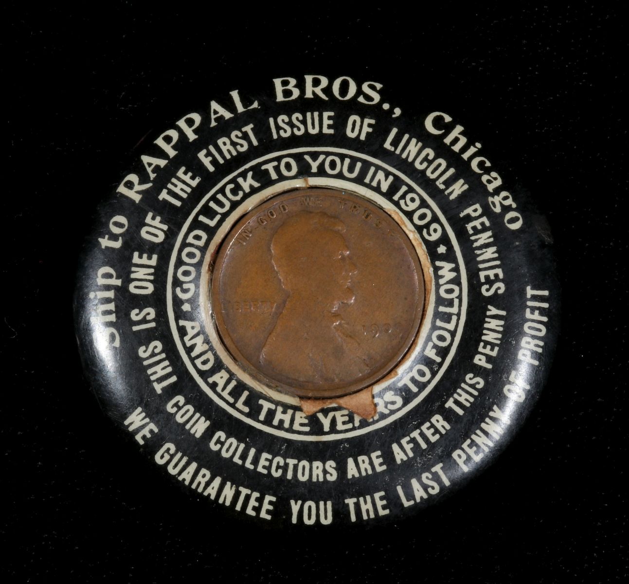 A 1909 ADVERTISING POCKET MIRROR WITH WHEAT PENNY