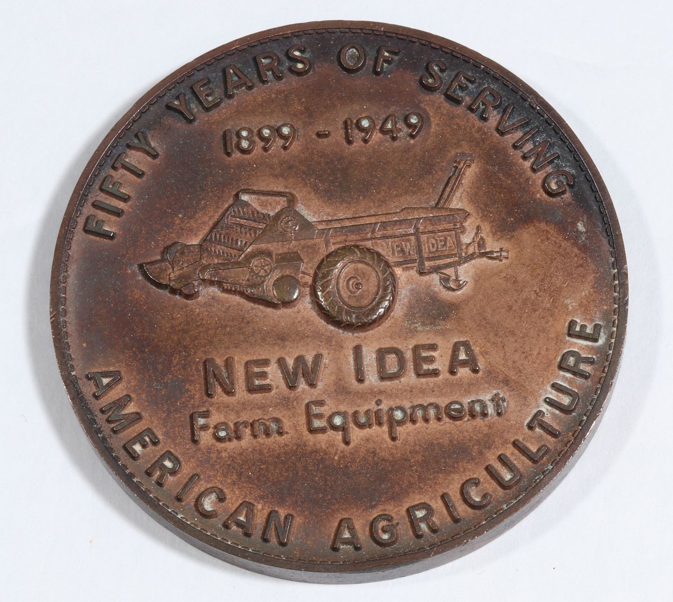 NEW IDEA IMPLEMENT 1949 ADVERTISING PAPERWEIGHT