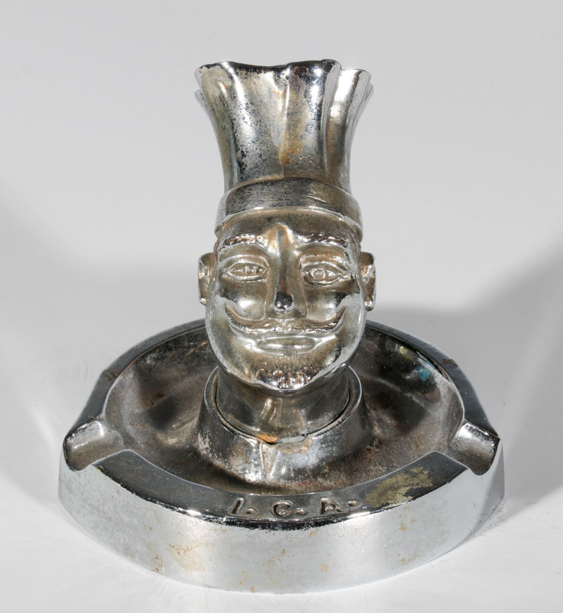 A VINTAGE FIGURAL CHEF ADVERTISING ASHTRAY