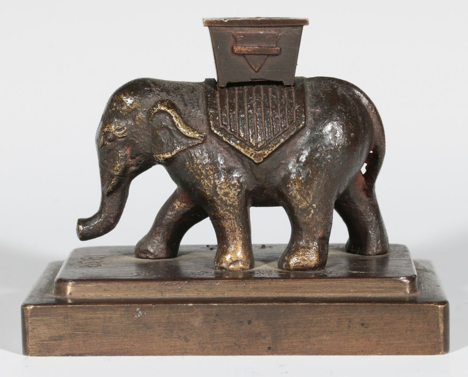 A 1939 FIGURAL BRONZE ELEPHANT PAPERWEIGHT