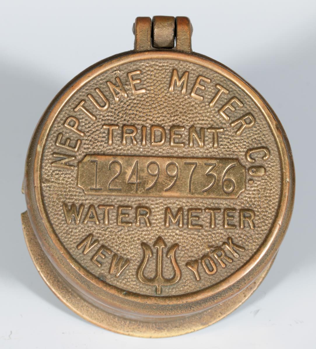 TWO BRASS NEPTUNE WATER METER COVERS