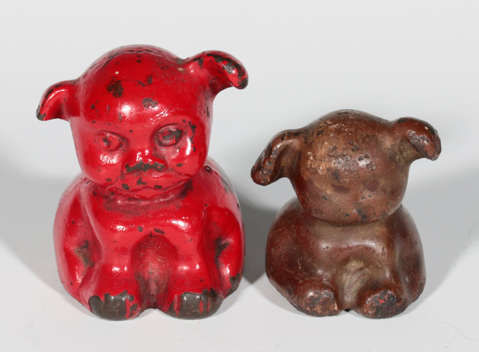 TWO CAST IRON DOGS ADVERTISING PAPERWEIGHTS