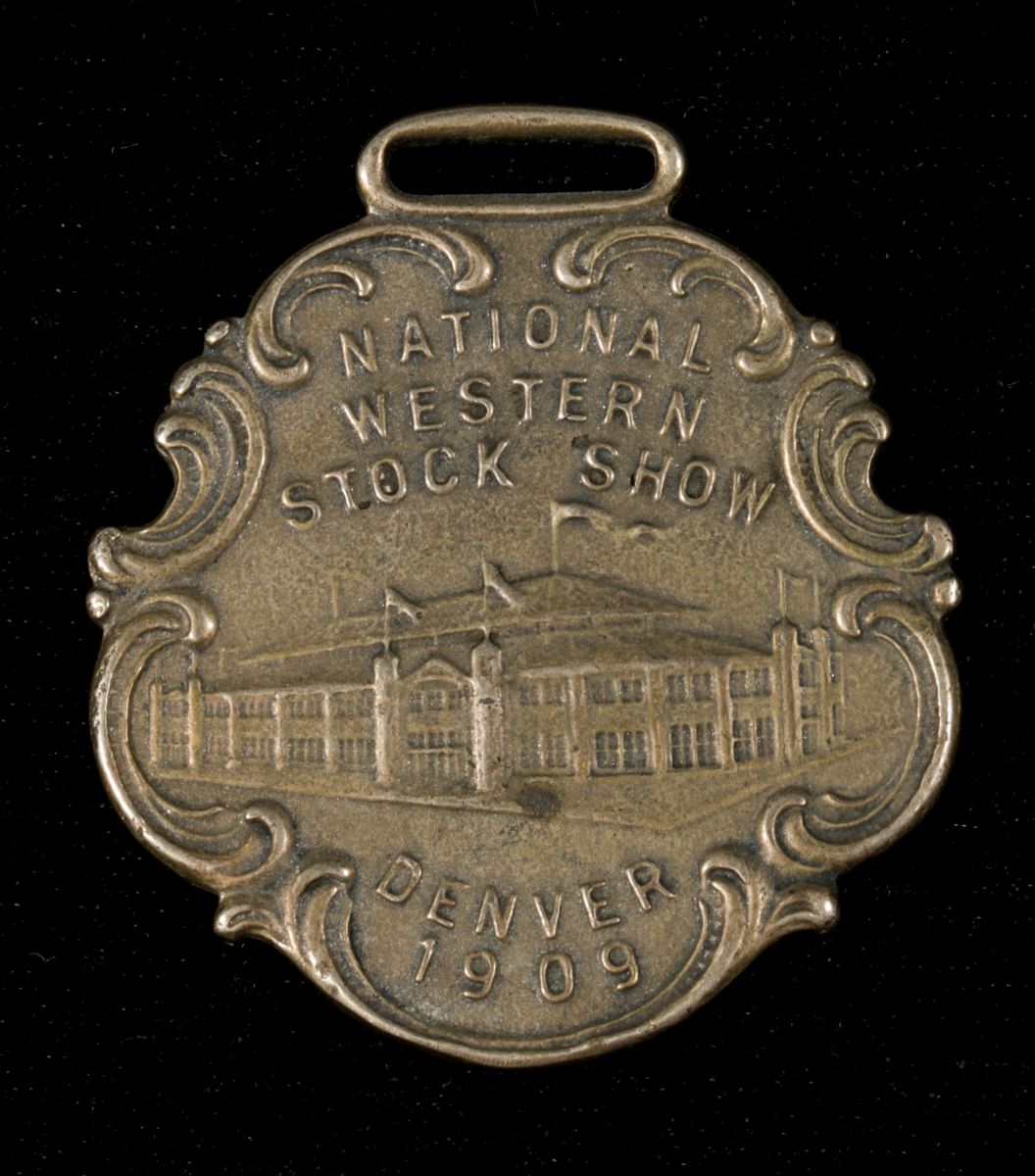 A 1909 NATIONAL WESTERN STOCK SHOW WATCH FOB