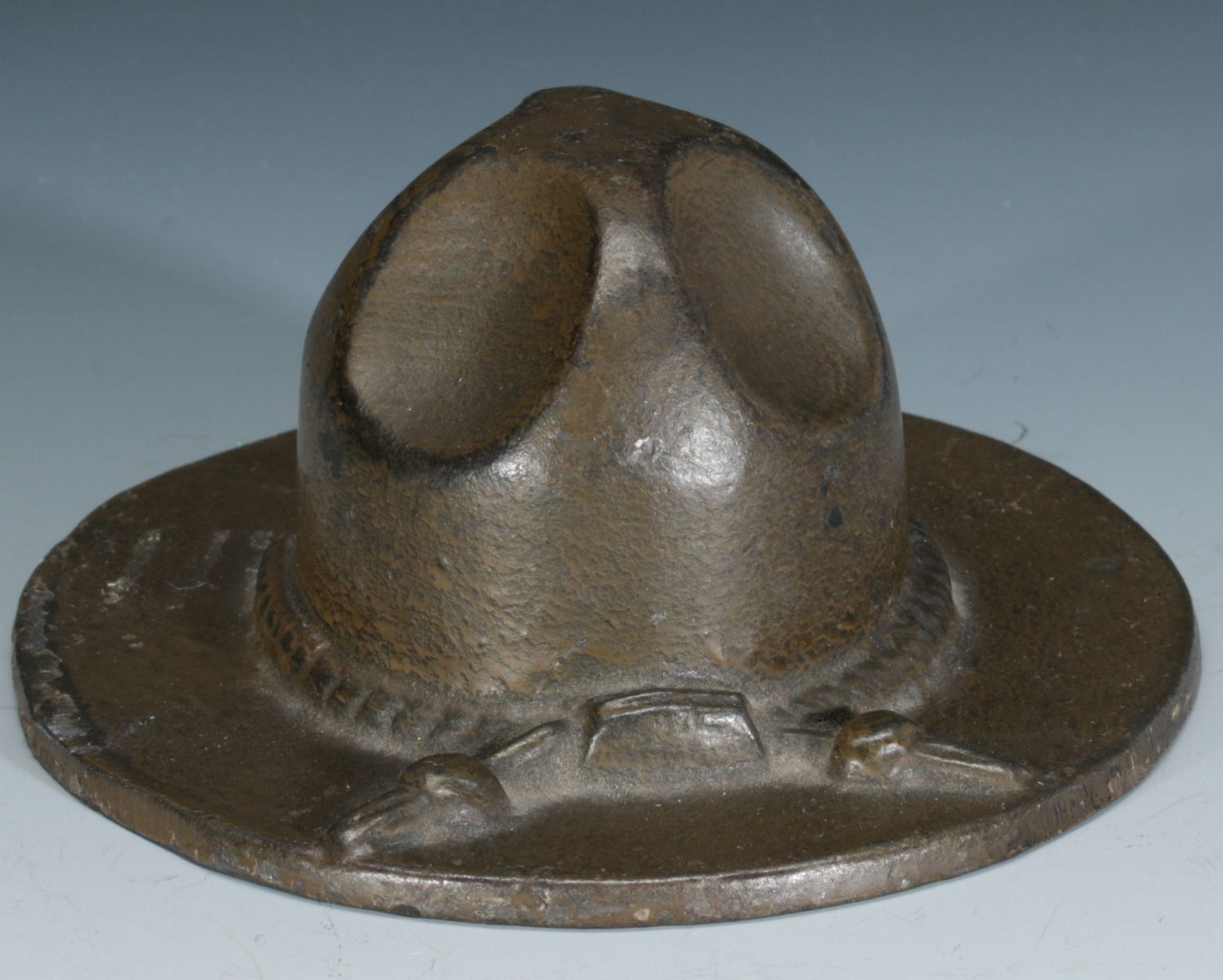 AN IRON WWI DOUGHBOY HAT ADVERTISING CHANNON EMERY STOVE