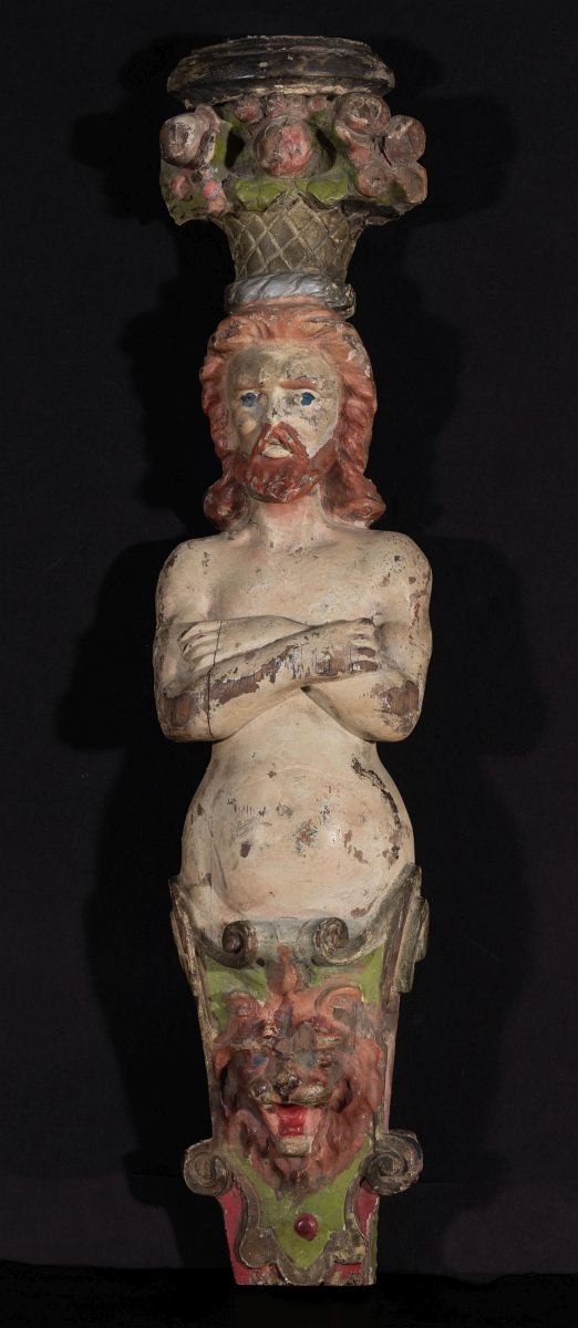 A LATE 19TH CENTURY CARVED AND PAINTED WOOD HERM