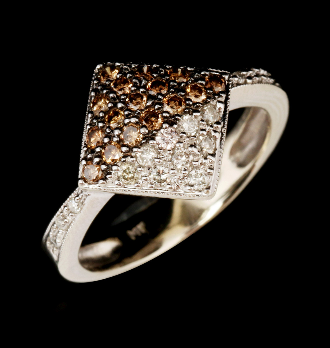 A BROWN AND WHITE DIAMOND 14K GOLD FASHION RING