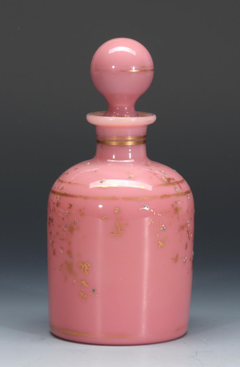 AN ANTIQUE FRENCH PINK OPALINE COLOGNE BOTTLE
