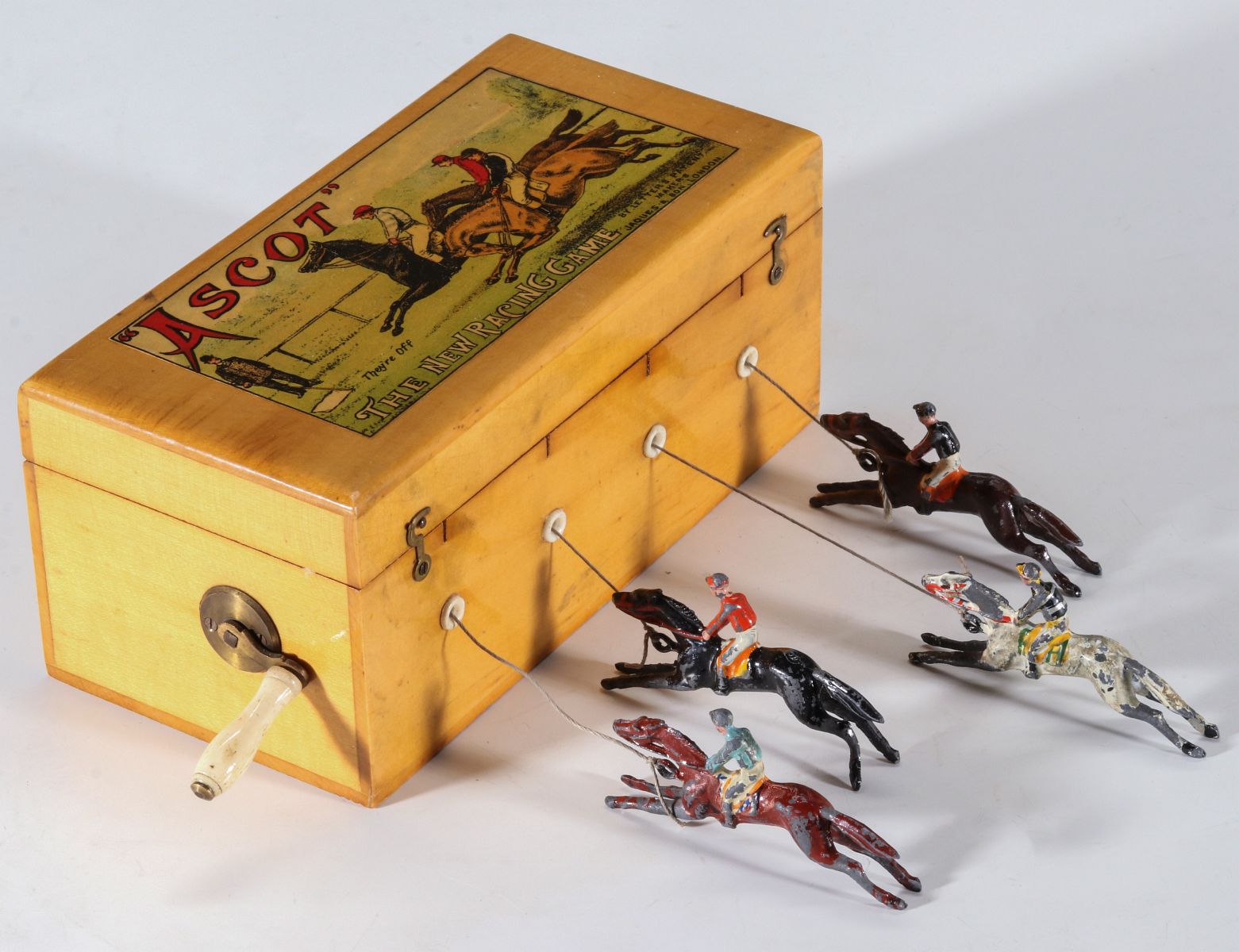A 19TH C. BRITISH HAND OPERATED HORSE RACE GAME