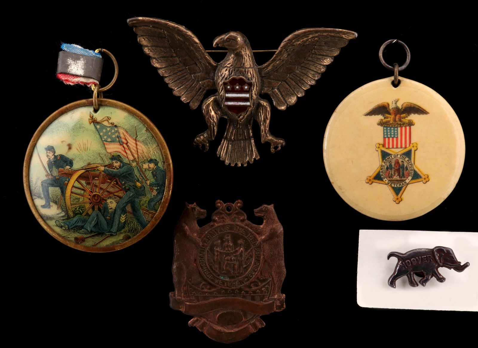 A COLLECTION OF GAR AND OTHER ANTIQUE BADGES