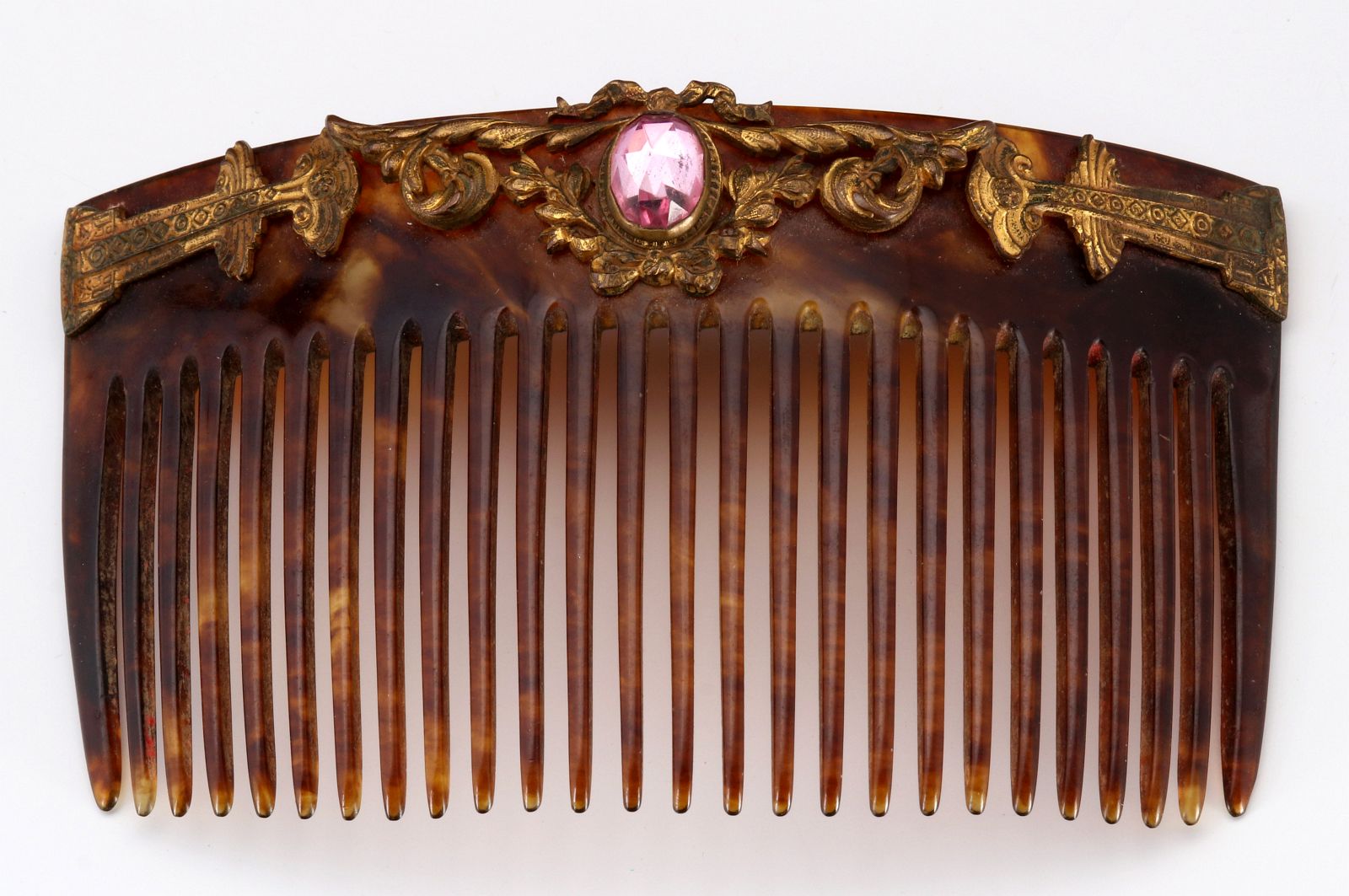 A VICTORIAN HAIR COMB WITH FACETED STONE MOUNTS