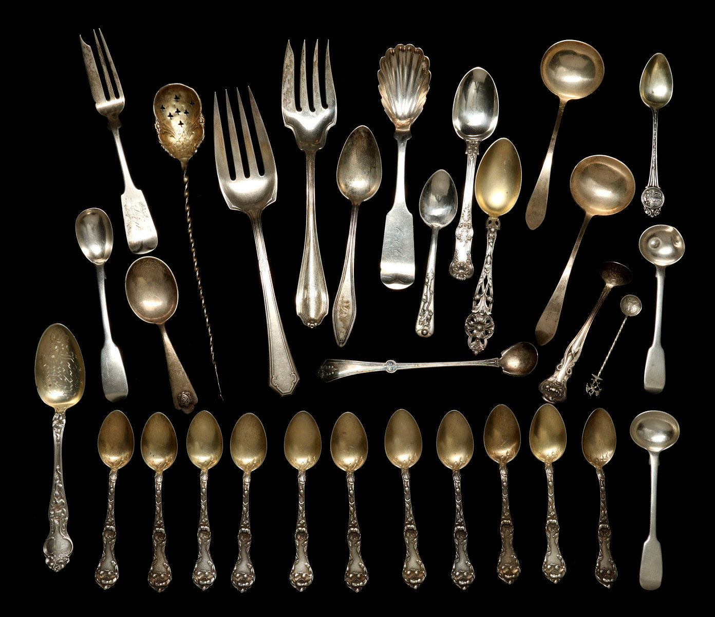 A COLLECTION OF STERLING SILVER FLATWARE