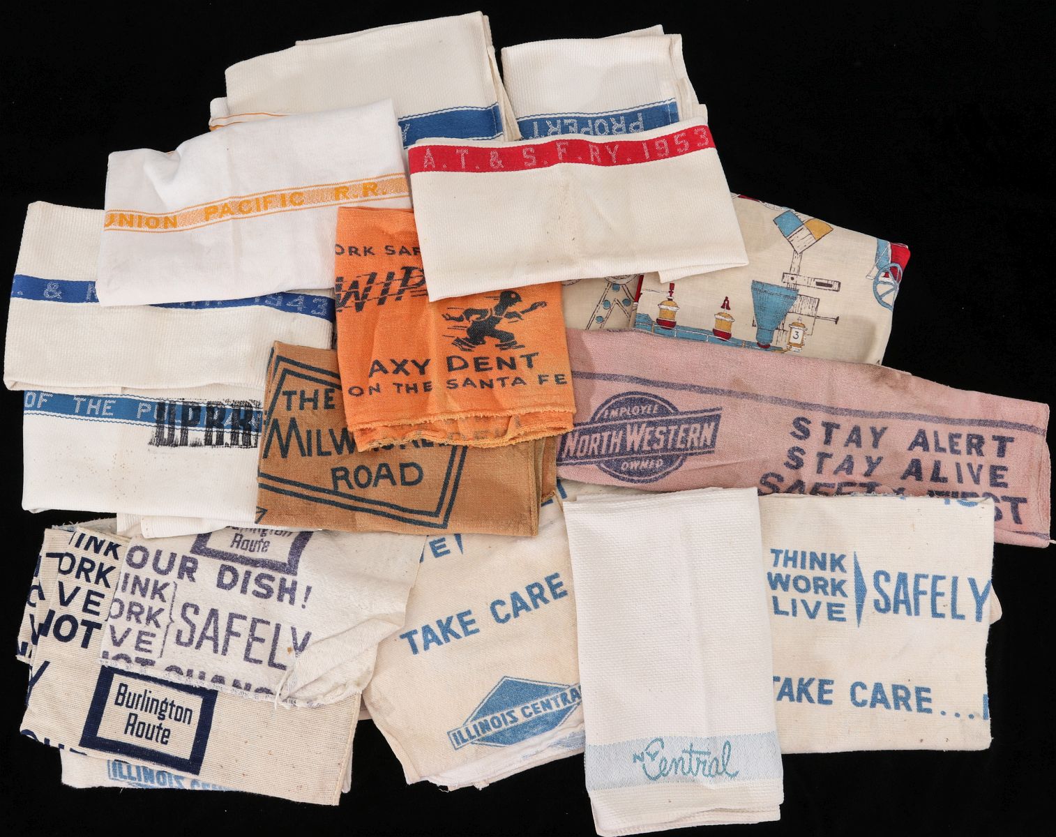 A COLLECTION OF RAILROAD EMBLAZONED TEXTILES