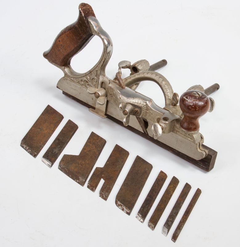 A STANLEY NO. 46 SKEW CUTTER PLANE WITH CUTTERS