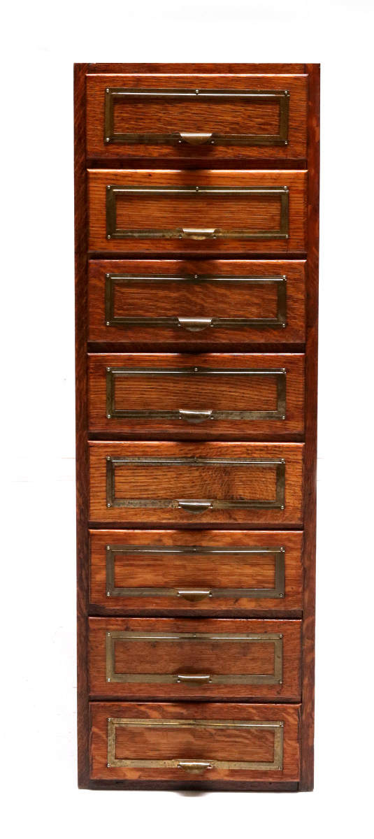 A NICE OAK EIGHT DRAWER FILE SYSTEM CABINET