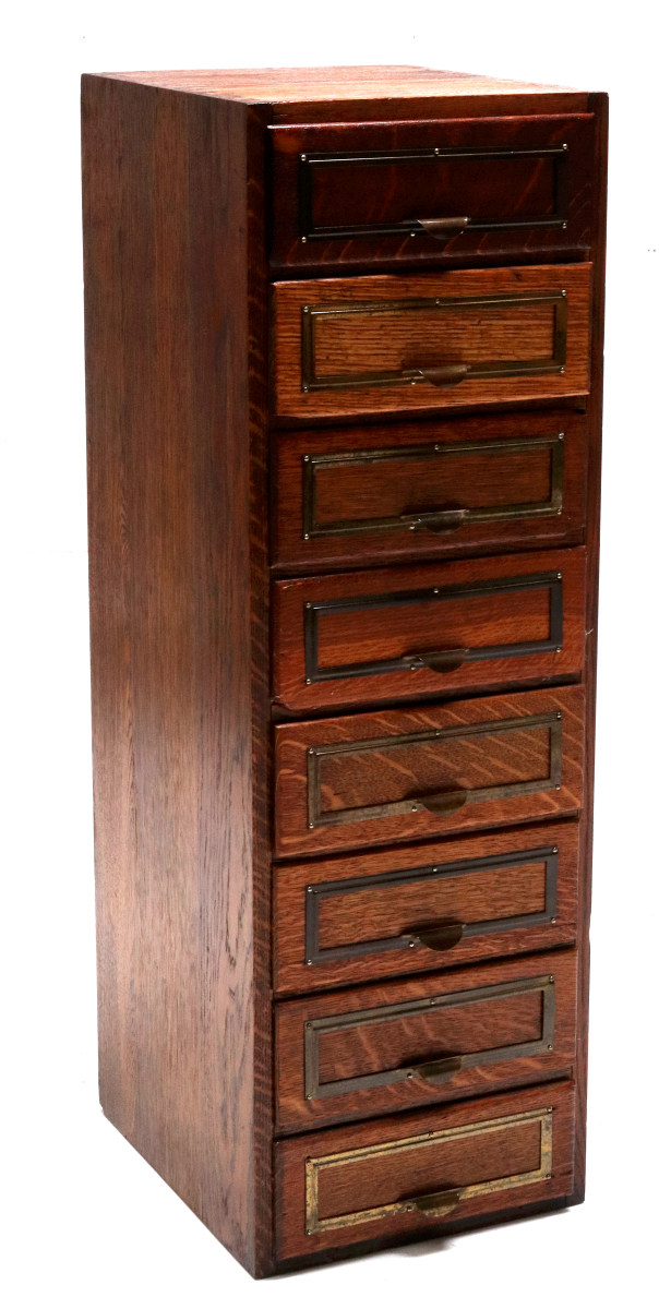 A NICE OAK EIGHT DRAWER FILE SYSTEM CABINET