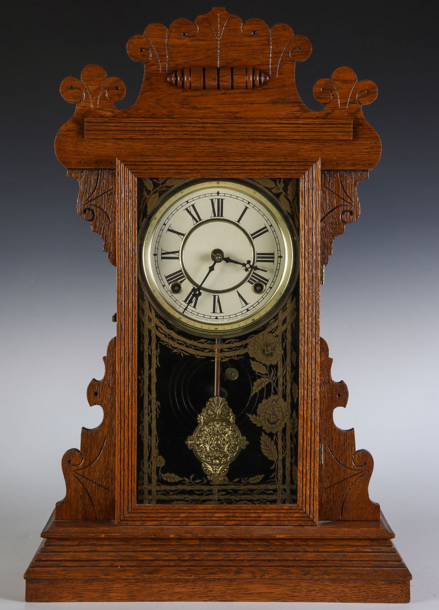 A KITCHEN GINGERBREAD CLOCK ATTRIBUTED E.N. WELCH