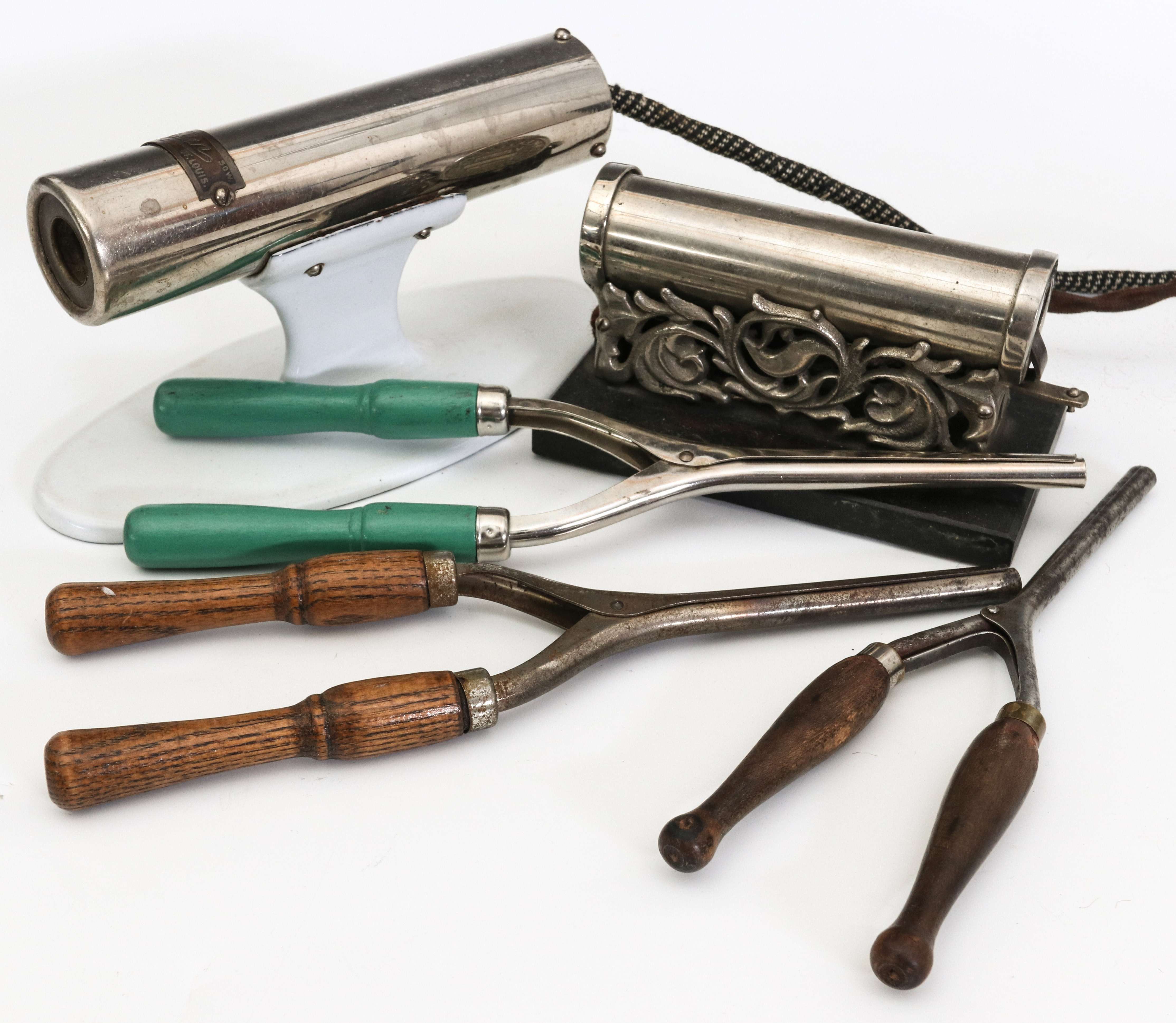 TWO UNUSUAL EARLY 20TH CENT CURLING IRON HEATERS