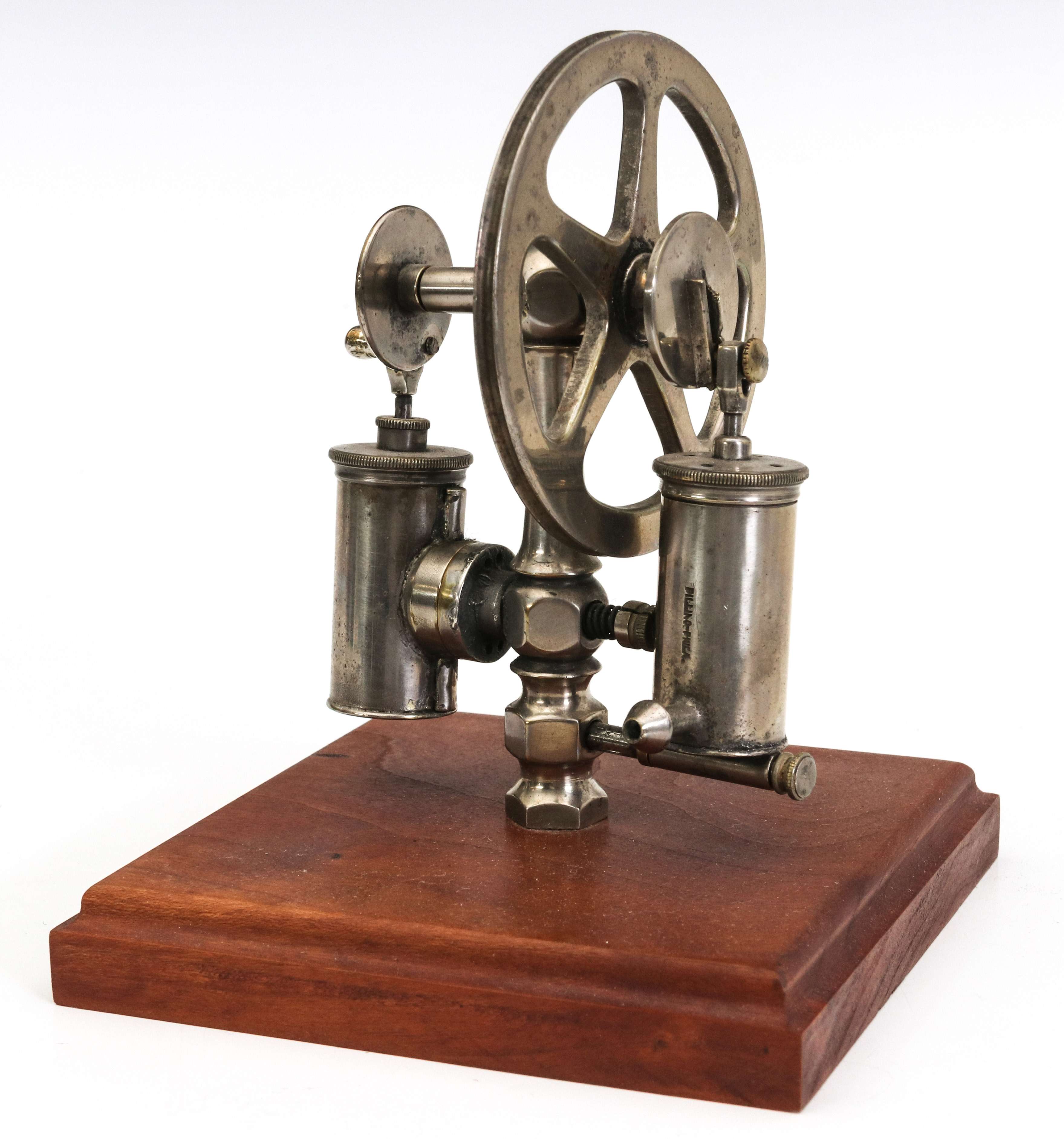 AN EARLY 20THC NICKELED BRASS ENGINE DEMONSTRATOR