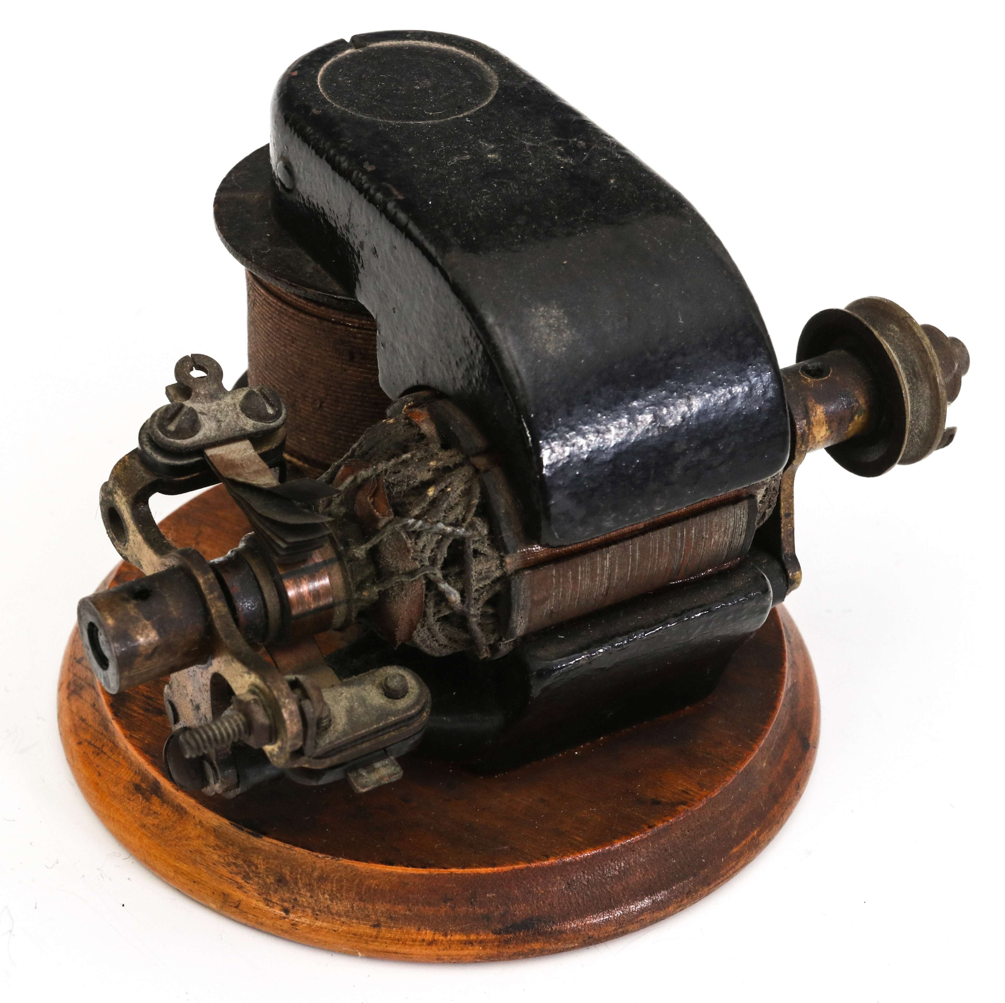 A 19TH C. CAST IRON AND BRASS OPEN COIL TOY MOTOR