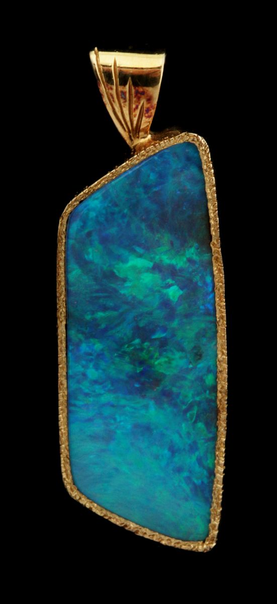 A UNIQUE MICKY ROOF 18K GOLD AND OPAL PENDANT