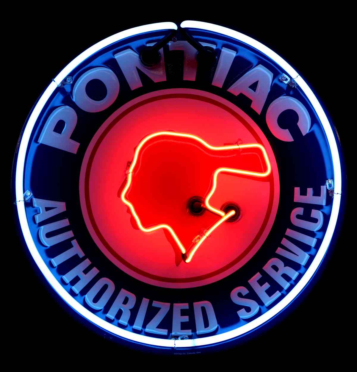 A MODERN PONTIAC SERVICE SIGN WITH NEON