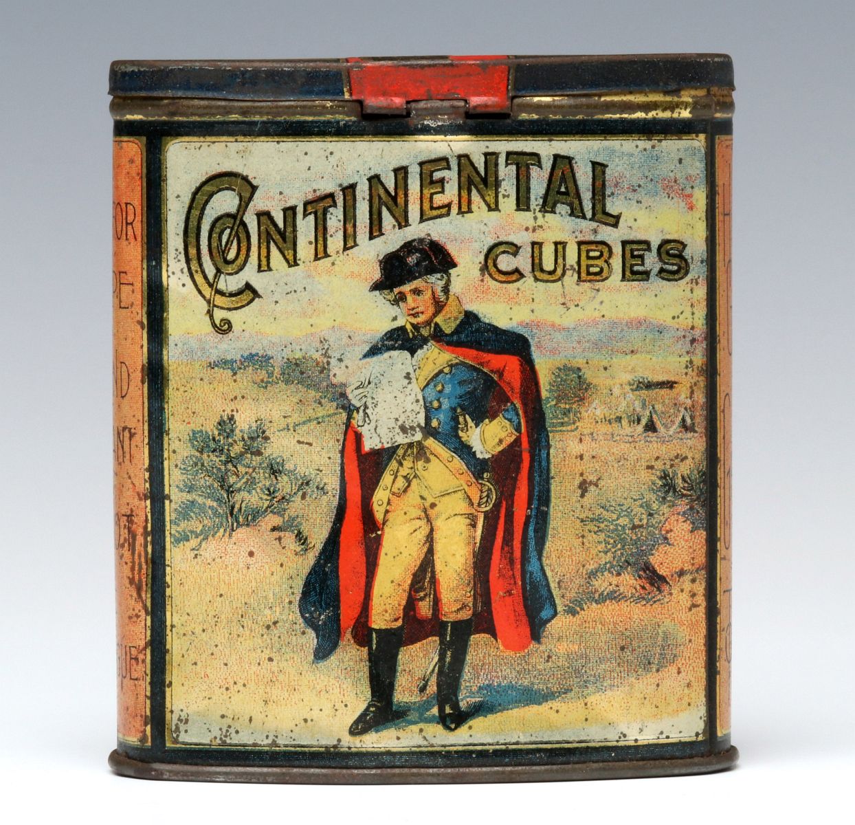 A CONTINENTAL CUBES BRAND POCKET TOBACCO TIN