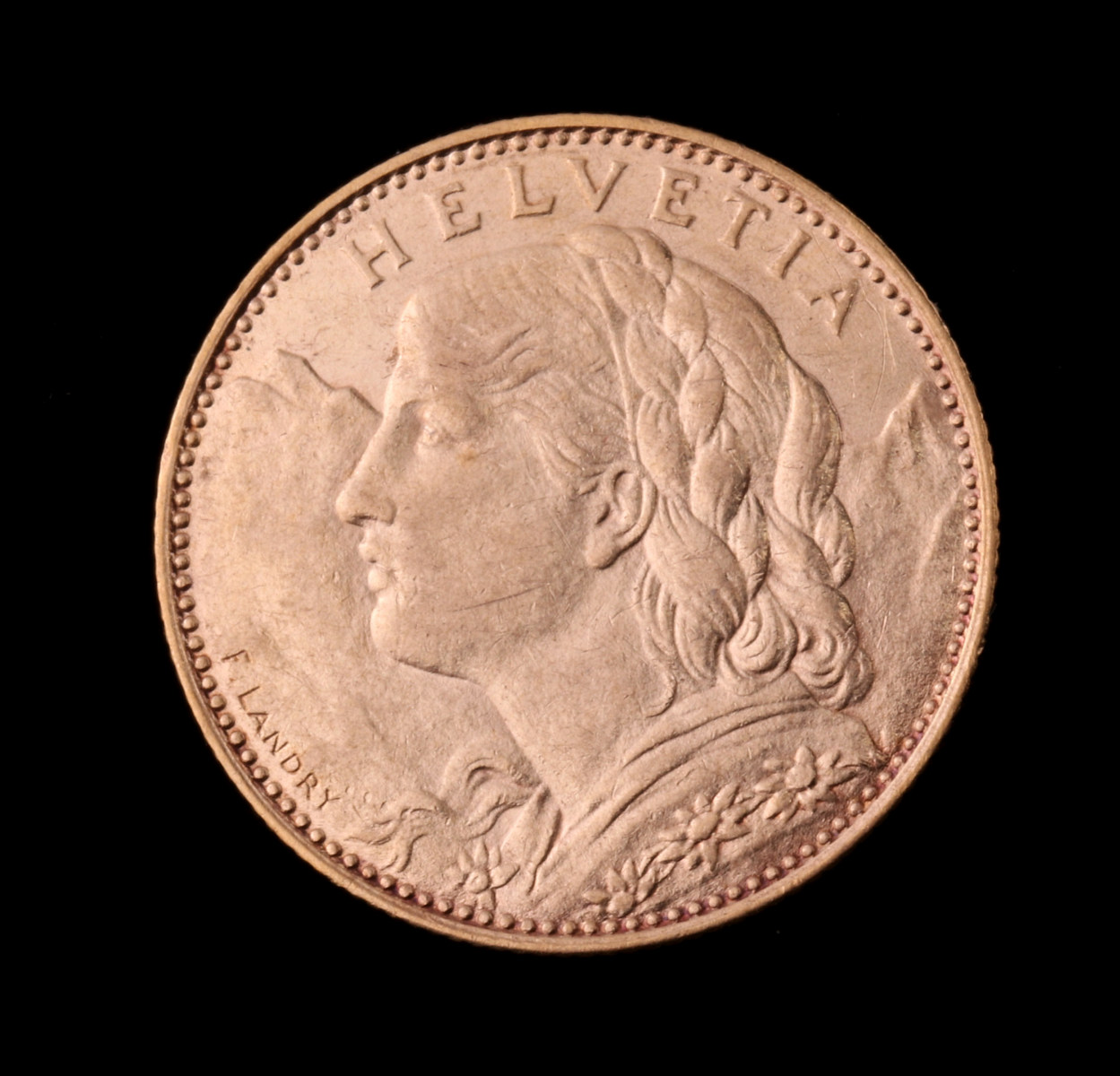 A 1914B SWISS 10 FRANC HELVETIA GOLD COIN