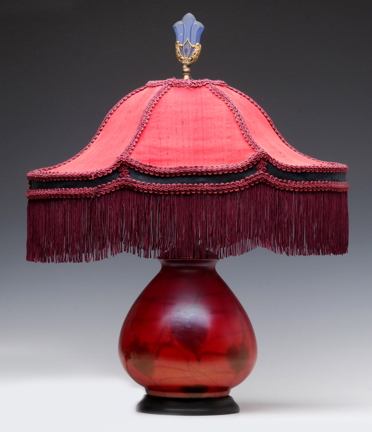 A SCARCE FENTON KARNAC RED OFF HAND TABLE LAMP