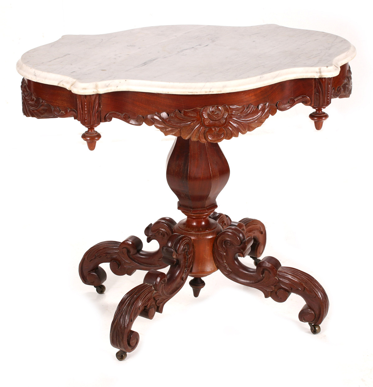 AN EARLY VICTORIAN TURTLE-TOP PARLOR TABLE