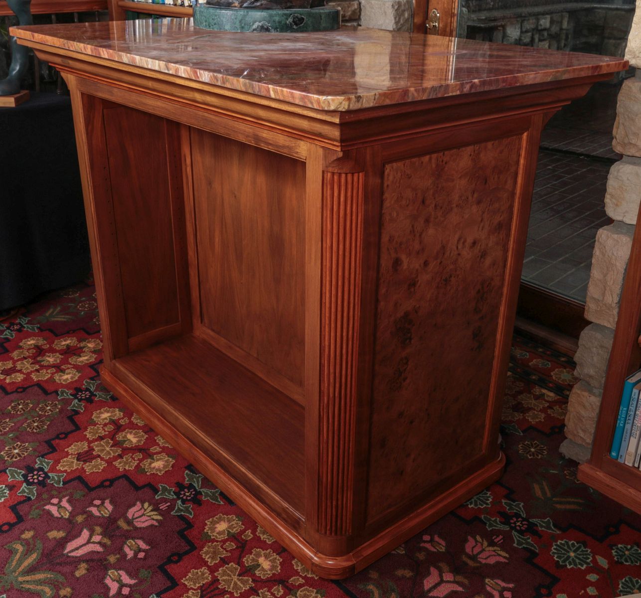 A MODERN CUSTOM BURLED CABINET WITH MARBLE TOP