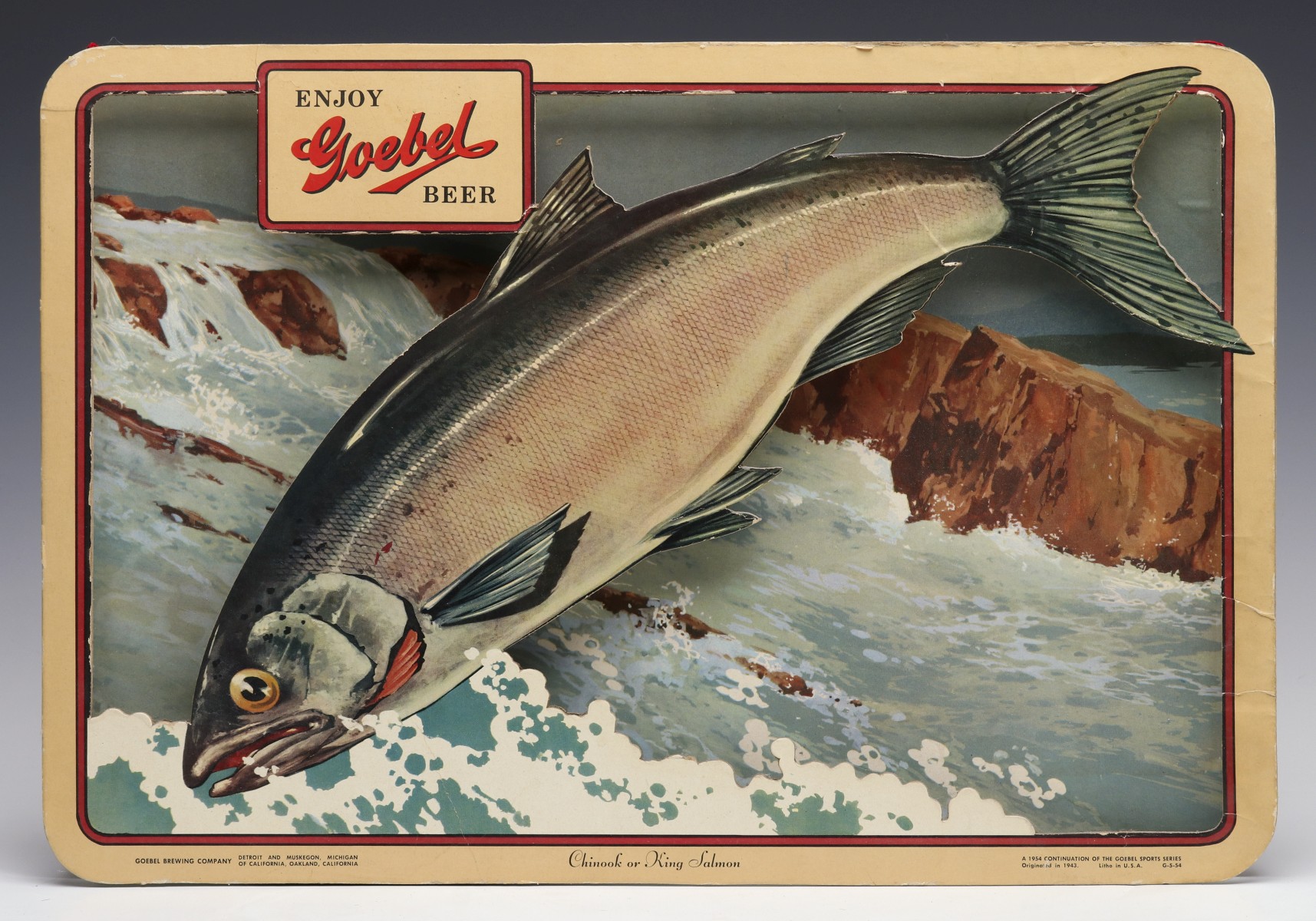 A GOEBEL BEER SIGN WITH LEAPING KING SALMON DATE 1954